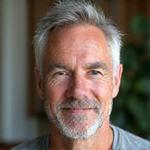 Michael B. in a relaxed pose with the Aura Meditation Headband on.