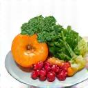 Icon representing healthy food, a balanced plate with fruits and vegetables